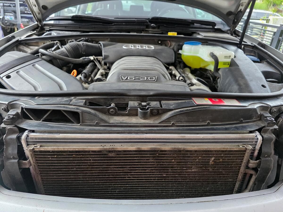 Audi 3.0 V6 engine bay during a European diagnostic and service